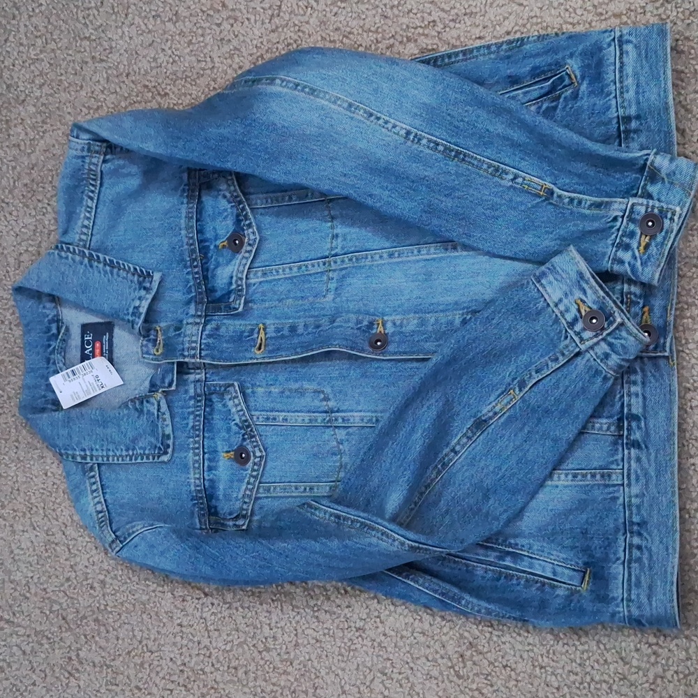 Children place denim jacket
